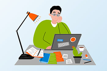 Studierender sitzt am Laptop