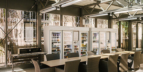 Atrium with vending machines, table and chairs