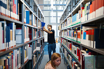 Two students in the library