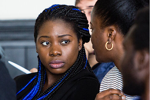 Two students having a conversation