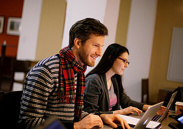 Students at their laptops
