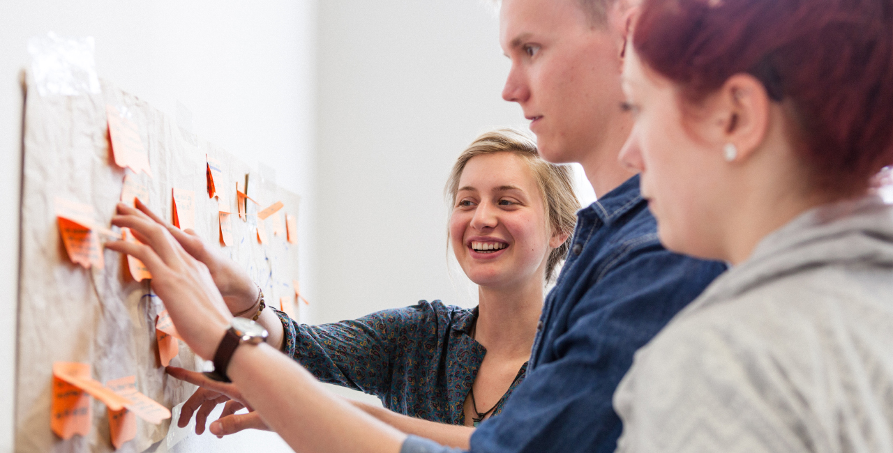 Students at a pinboard